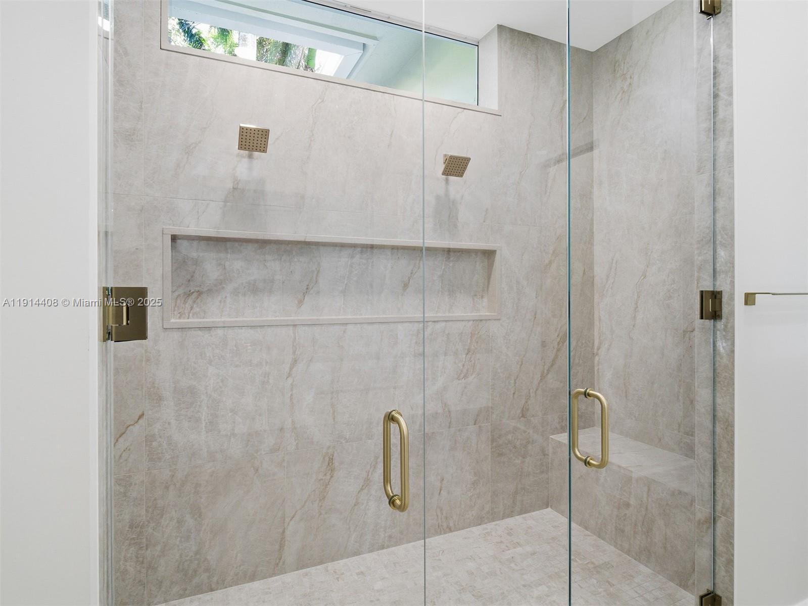 7675 Steeplechase Drive Palm Beach Gardens, FL 33418 - Photo 22 of 36 a bathroom with a shower