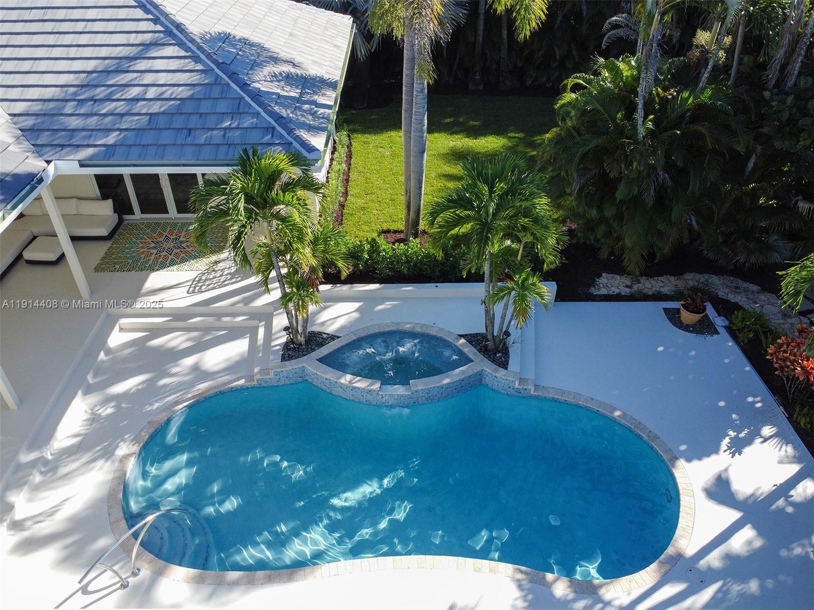 7675 Steeplechase Drive Palm Beach Gardens, FL 33418 - Photo 26 of 36 a view of a porch with a yard