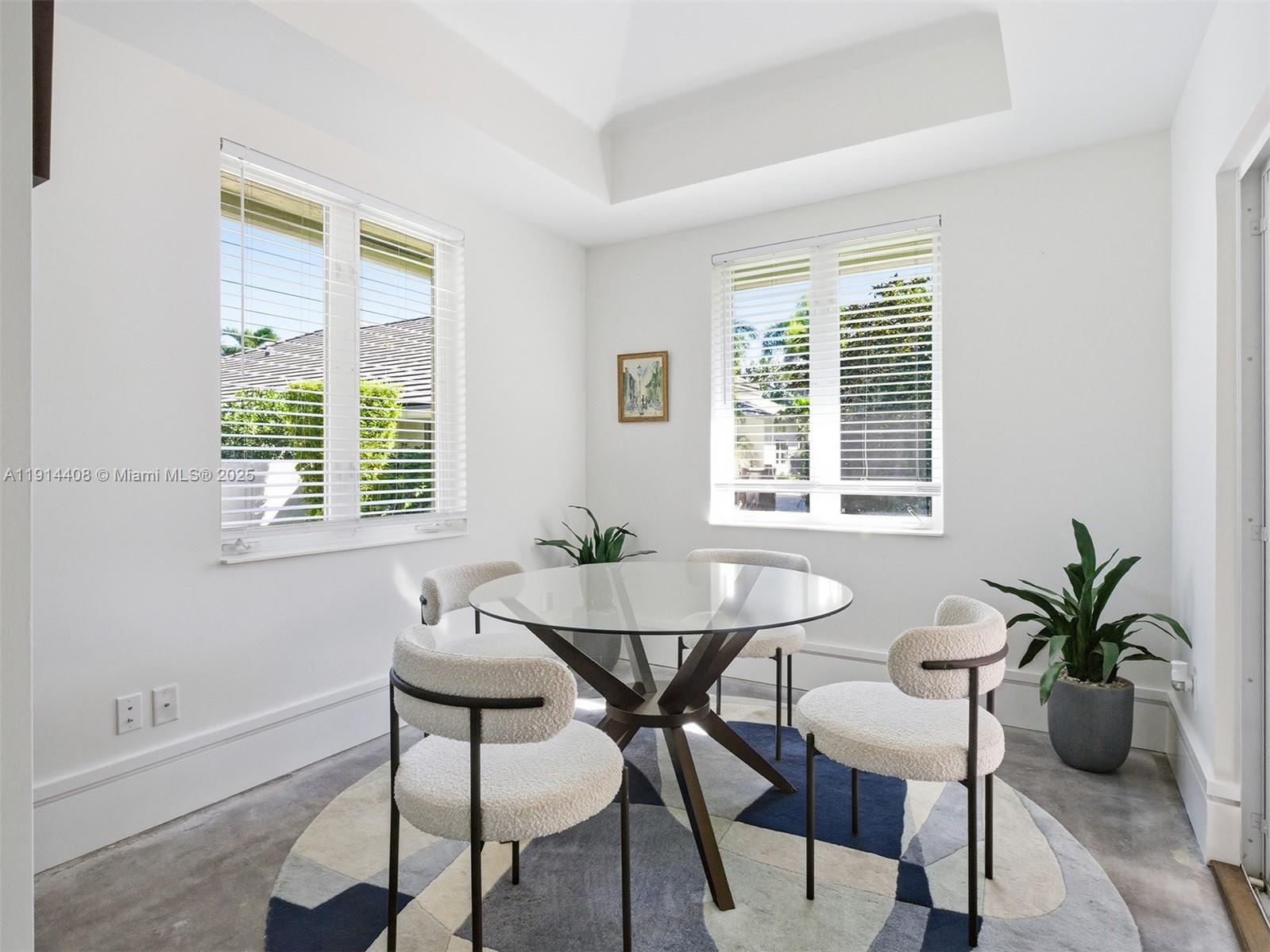 7675 Steeplechase Drive Palm Beach Gardens, FL 33418 - Photo 34 of 36 a dining room with furniture and window