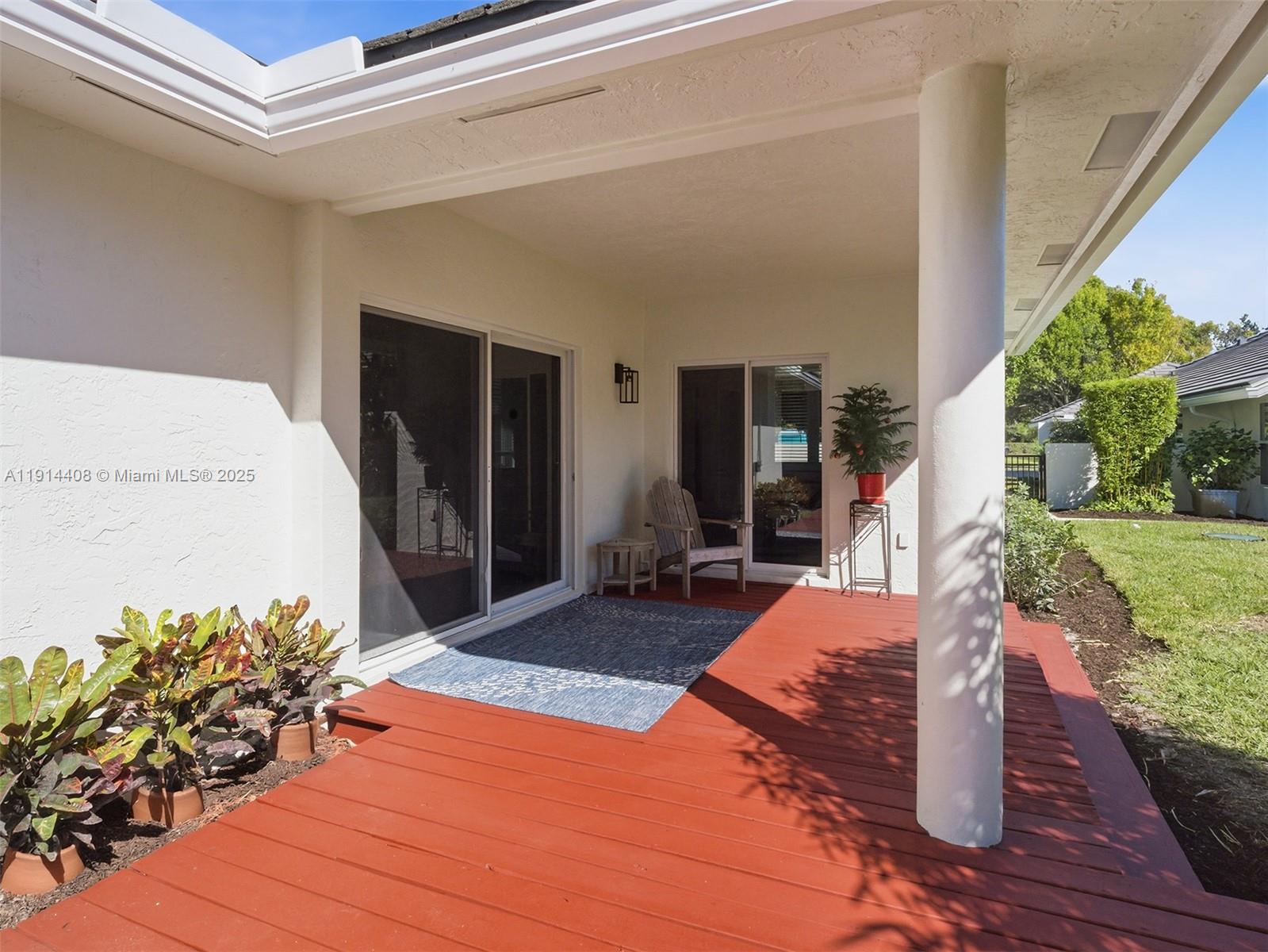 7675 Steeplechase Drive Palm Beach Gardens, FL 33418 - Photo 35 of 36 a view of a backyard of the house