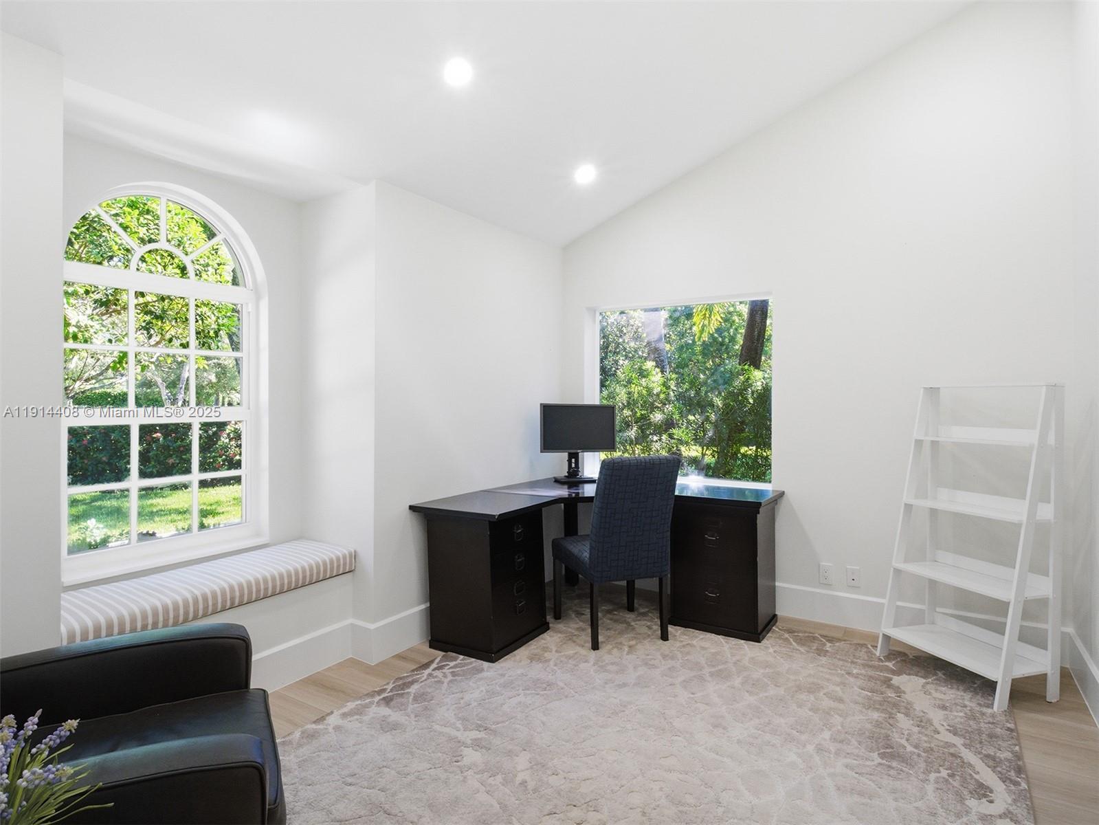 7675 Steeplechase Drive Palm Beach Gardens, FL 33418 - Photo 10 of 36 a workspace with furniture and a window