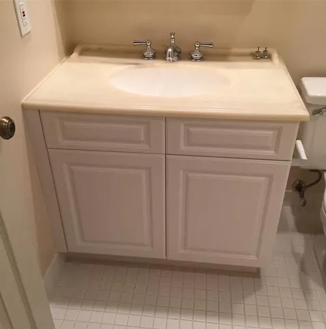 a bathroom with a toilet and a bathtub