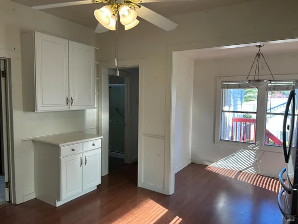 a view of an empty room and window