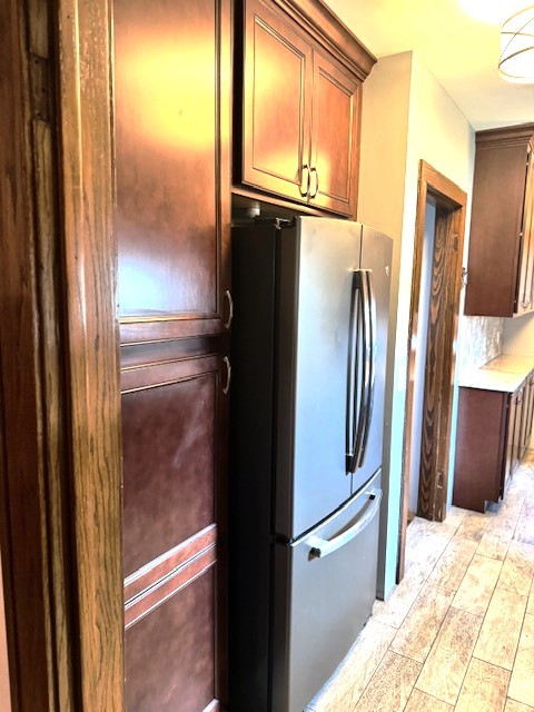 430 Enterprise Street Elgin, IL 60120 - Photo 5 of 18 a view of a refrigerator a kitchen and a window