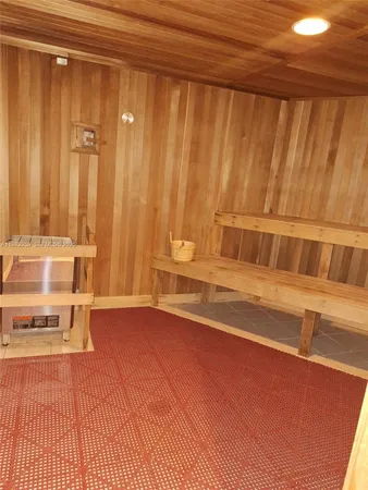 a view of wooden floor and a window