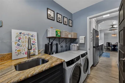 a view of a kitchen from the hallway