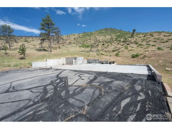 a view of a backyard of a house