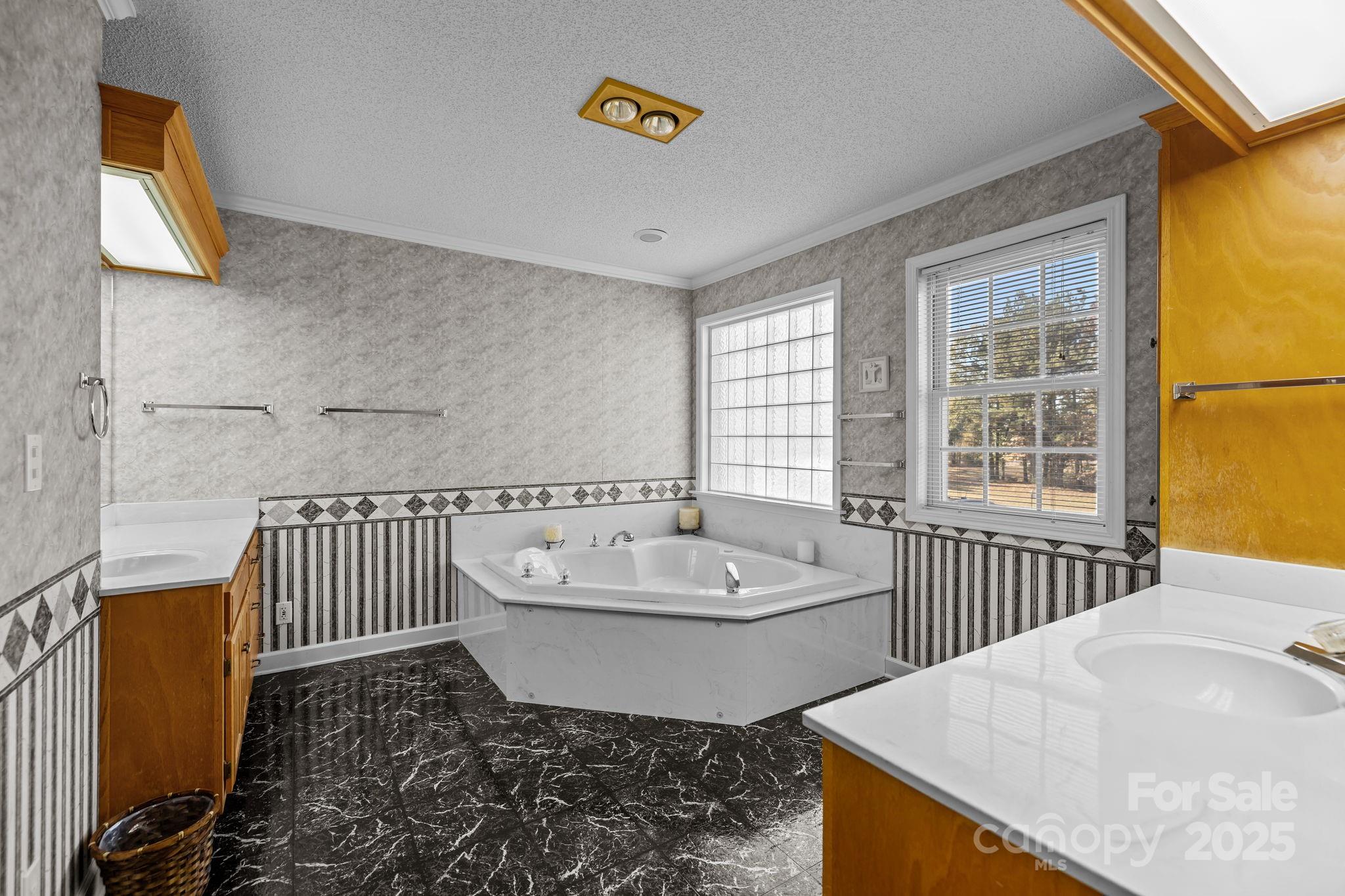 2363 Armenia Road Chester, SC 29706 - Photo 15 of 36 a spacious bathroom with a tub sink and mirror