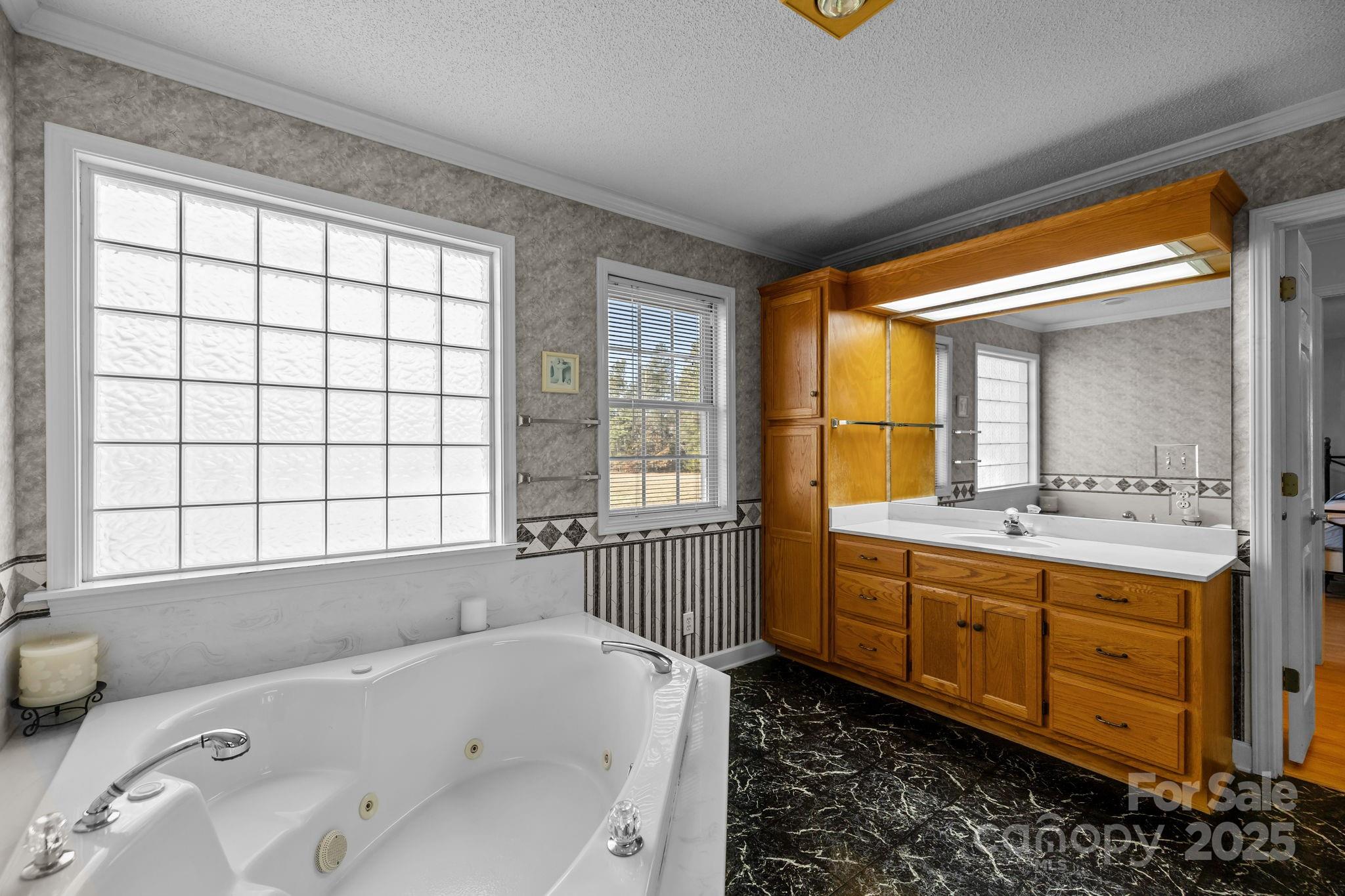 2363 Armenia Road Chester, SC 29706 - Photo 16 of 36 a bathroom with a bathtub sink and mirror