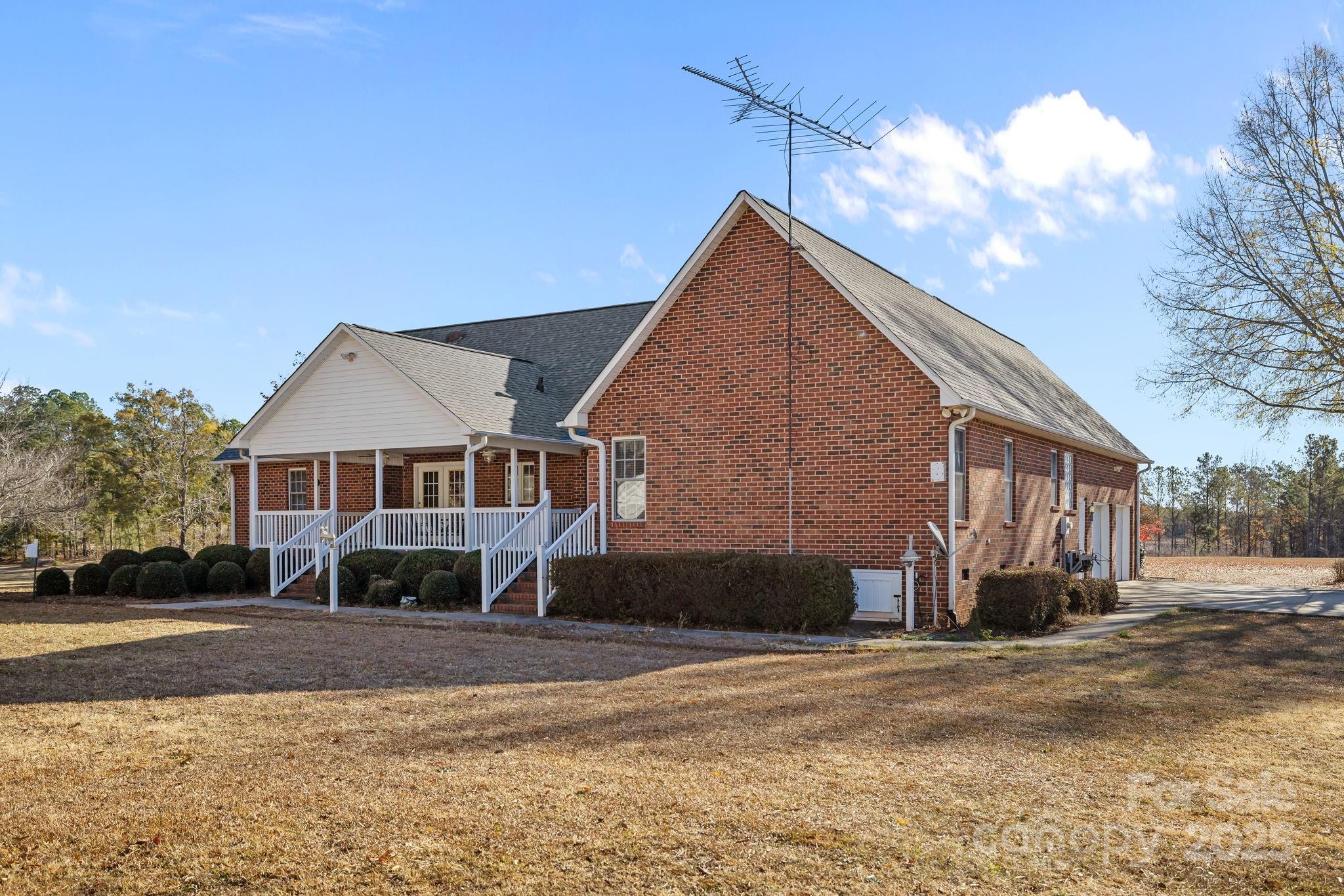 2363 Armenia Road Chester, SC 29706 - Photo 25 of 36 a front view of a house with a yard