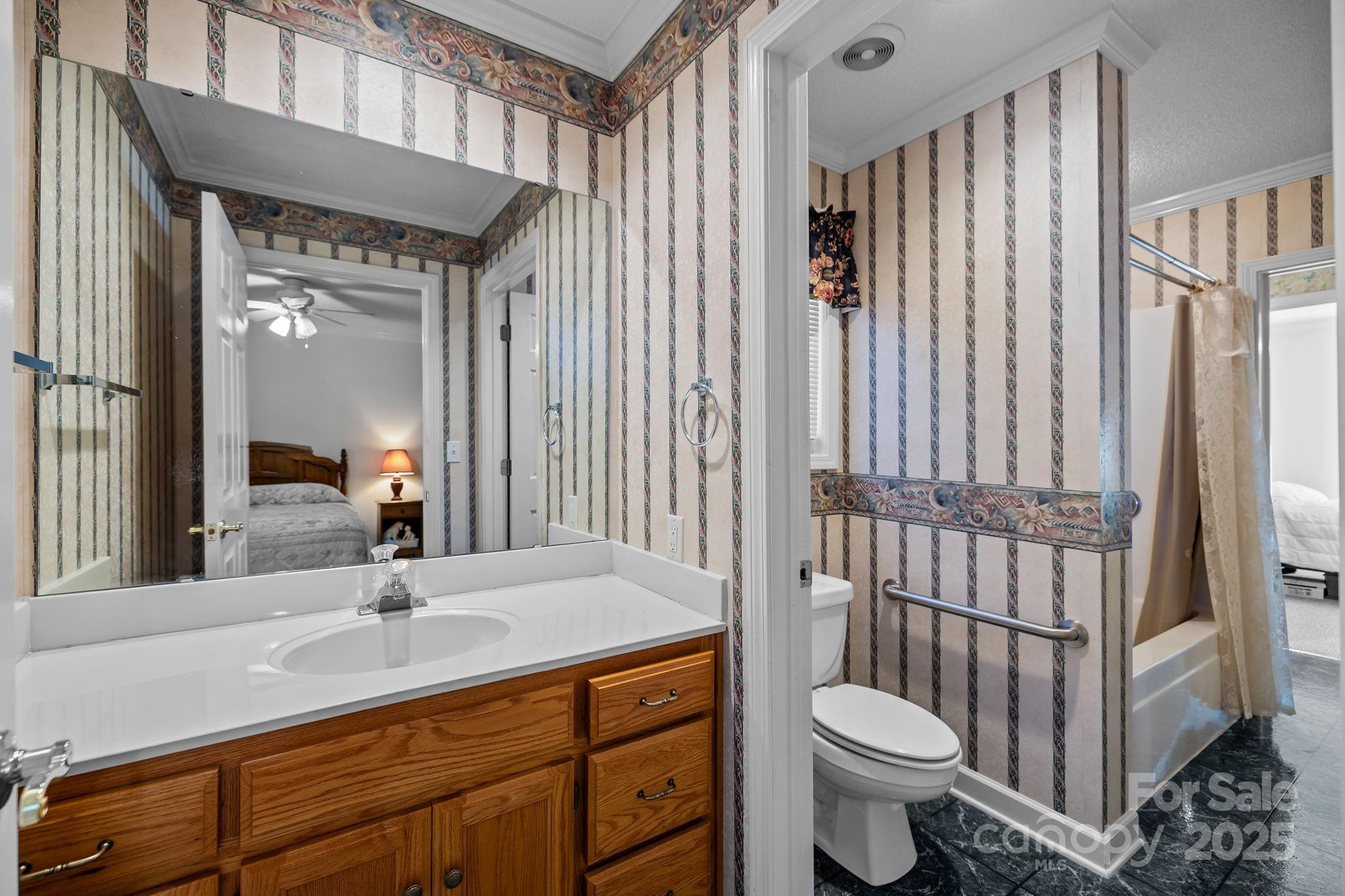 2363 Armenia Road Chester, SC 29706 - Photo 5 of 36 a bathroom with a sink toilet and shower