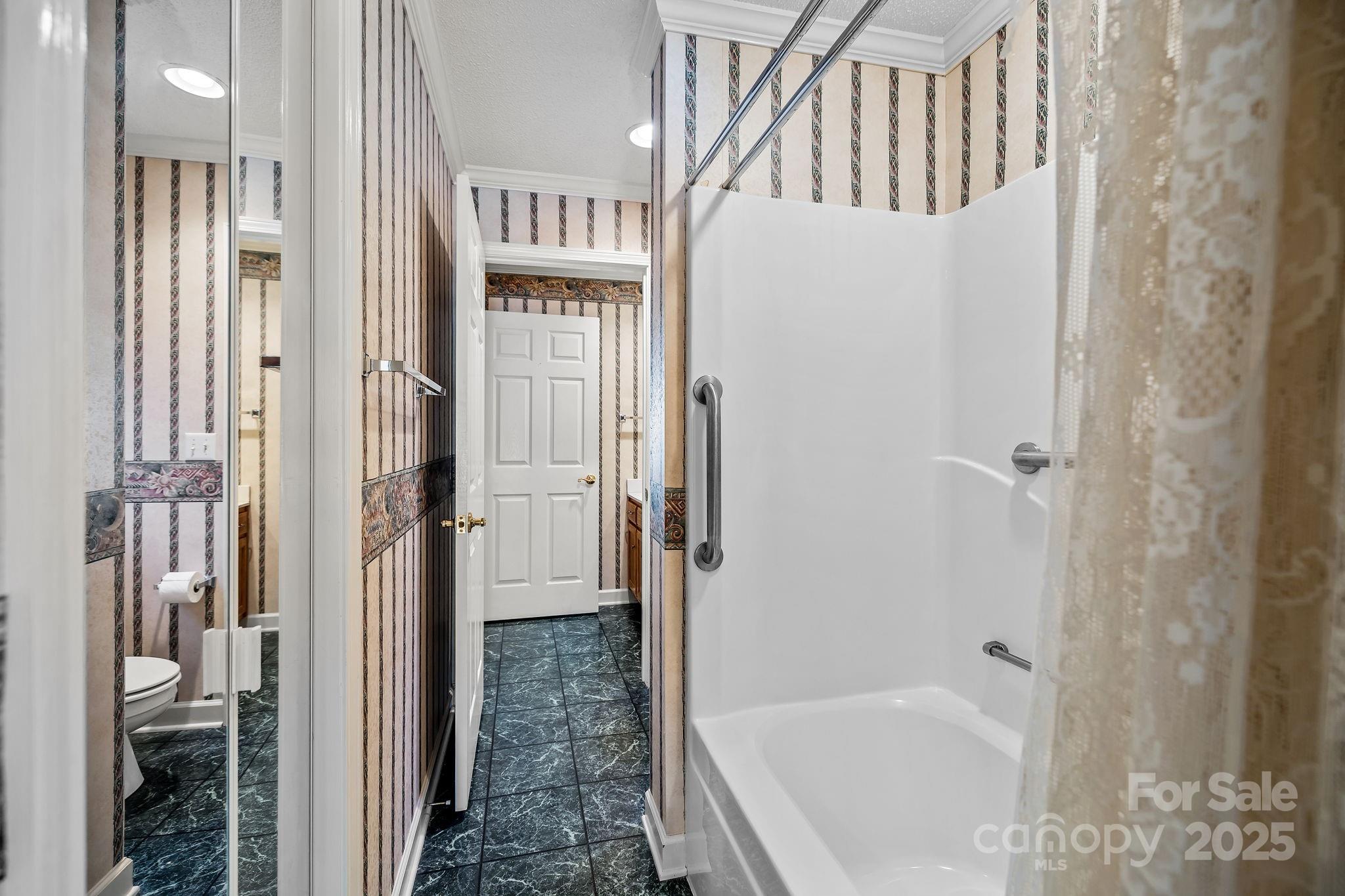 2363 Armenia Road Chester, SC 29706 - Photo 6 of 36 a bathroom with a bathtub and a shower