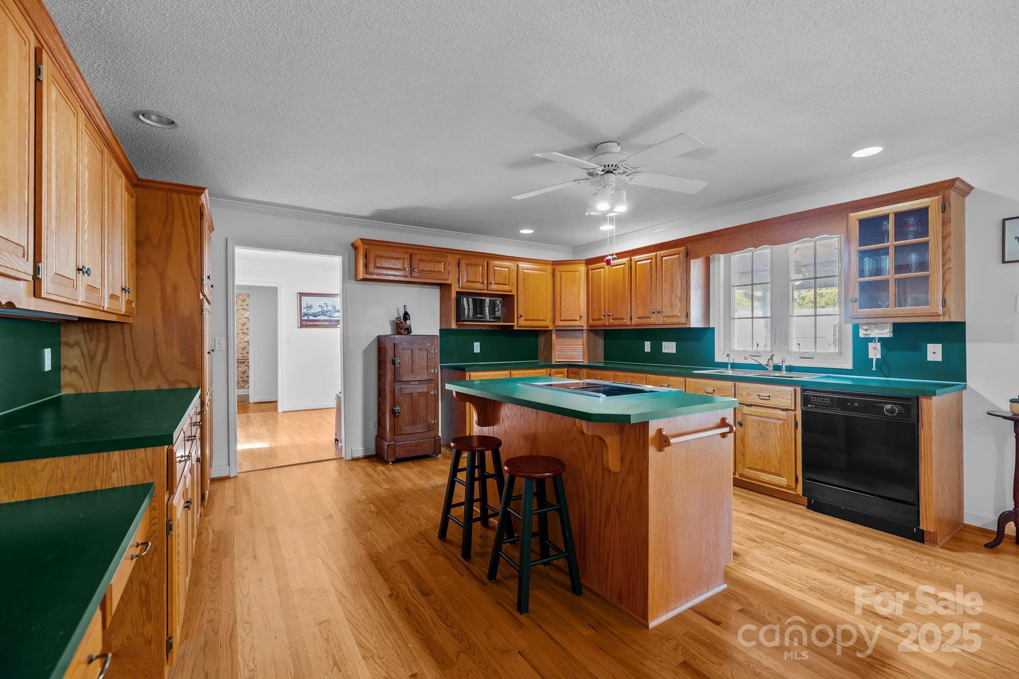 2363 Armenia Road Chester, SC 29706 - Photo 10 of 36 a kitchen with stainless steel appliances granite countertop a stove and a refrigerator