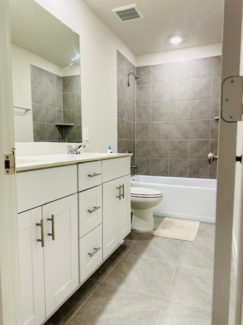 10818 Bodie Hls Drive Rosharon, TX 77583 - Photo 11 of 21 a bathroom with a double vanity sink toilet and shower