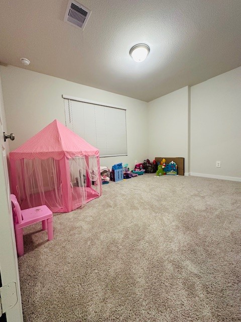 10818 Bodie Hls Drive Rosharon, TX 77583 - Photo 14 of 21 a bedroom with a bed and chandelier