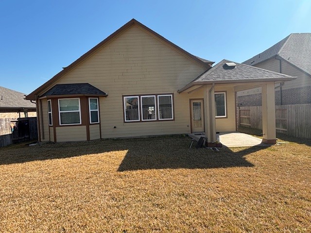 10818 Bodie Hls Drive Rosharon, TX 77583 - Photo 16 of 21 a front view of a house with a yard
