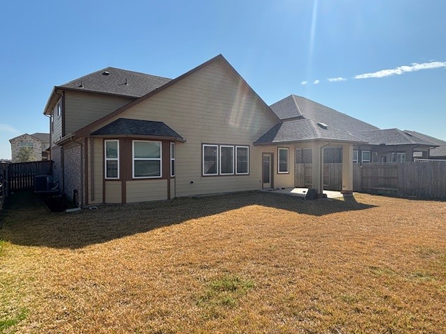 10818 Bodie Hls Drive Rosharon, TX 77583 - Photo 17 of 21 a front view of a house with a yard