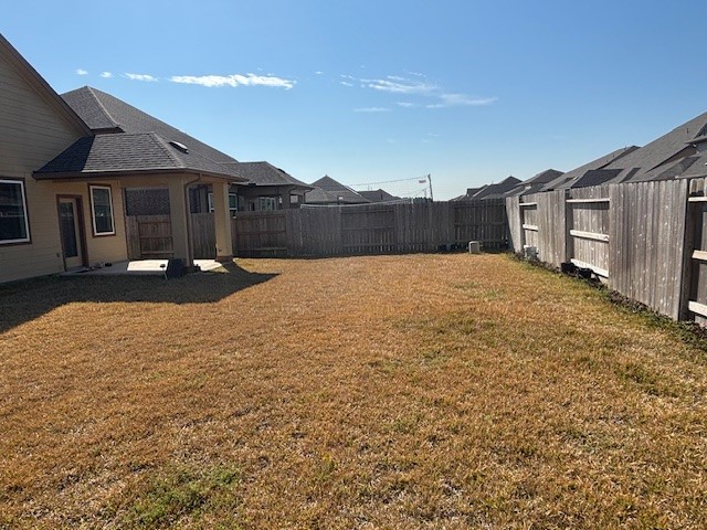 10818 Bodie Hls Drive Rosharon, TX 77583 - Photo 18 of 21 a view of a house with a yard