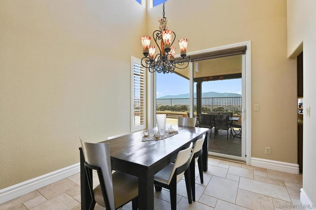 1035 Park Meadows Road Chula Vista, CA 91915 - Photo 11 of 35 a view of a dining room with furniture window and outside view