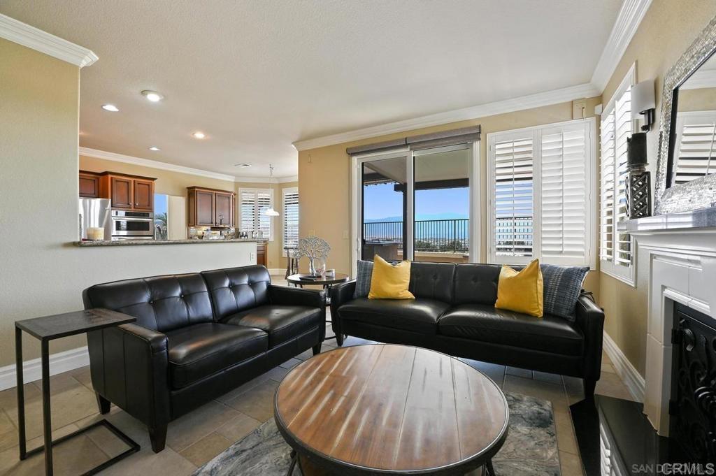1035 Park Meadows Road Chula Vista, CA 91915 - Photo 14 of 35 a living room with furniture and a large window