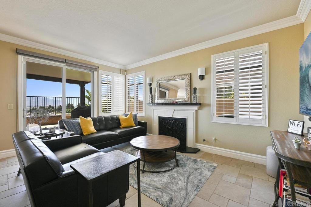 1035 Park Meadows Road Chula Vista, CA 91915 - Photo 15 of 35 a living room with furniture and a fireplace