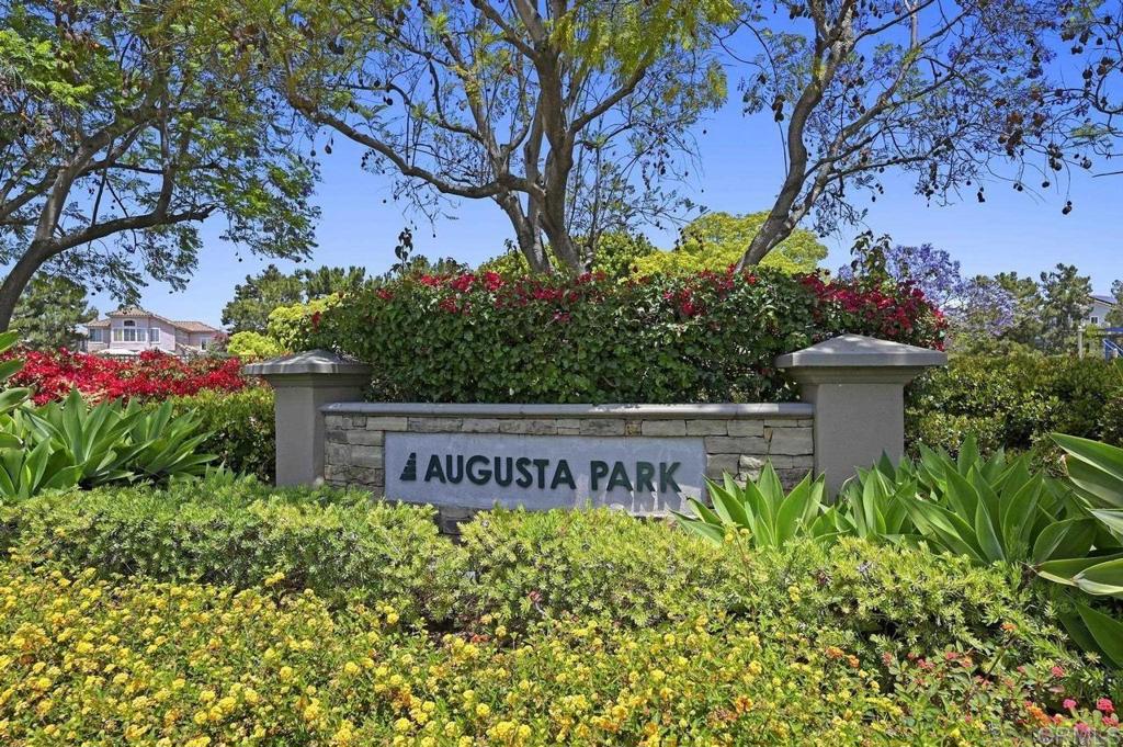 1035 Park Meadows Road Chula Vista, CA 91915 - Photo 34 of 35 a sign that is sitting in front of a tree