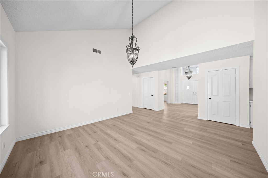 5498 Shadow Lane Rancho Cucamonga, CA 91737 - Photo 27 of 51 a view of empty room with wooden floor