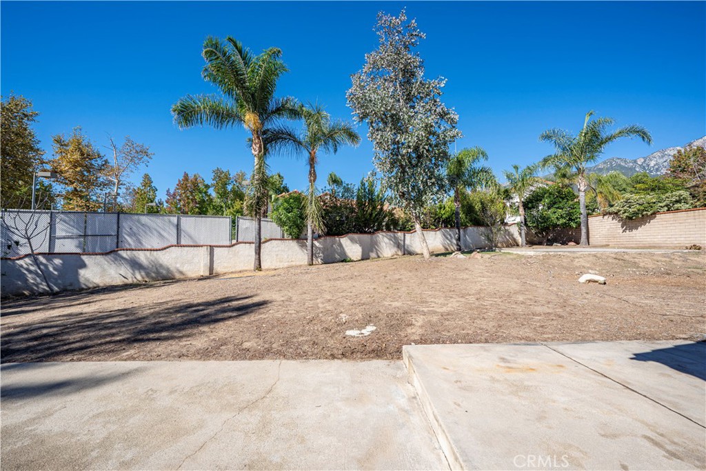 5498 Shadow Lane Rancho Cucamonga, CA 91737 - Photo 38 of 51 a view of a yard with a fountain