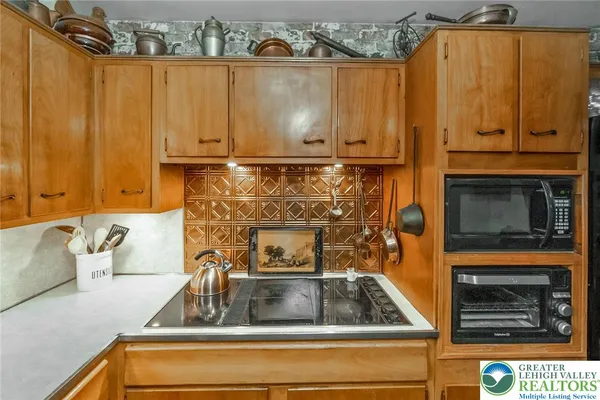a bathroom with a sink and a shower curtain