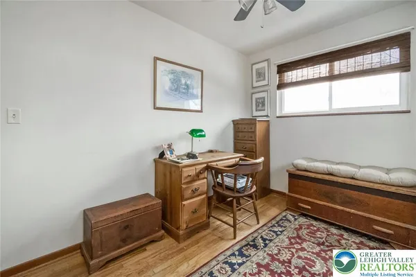 a workspace with furniture and window
