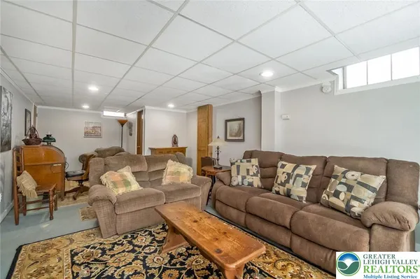 a living room with furniture and a couch