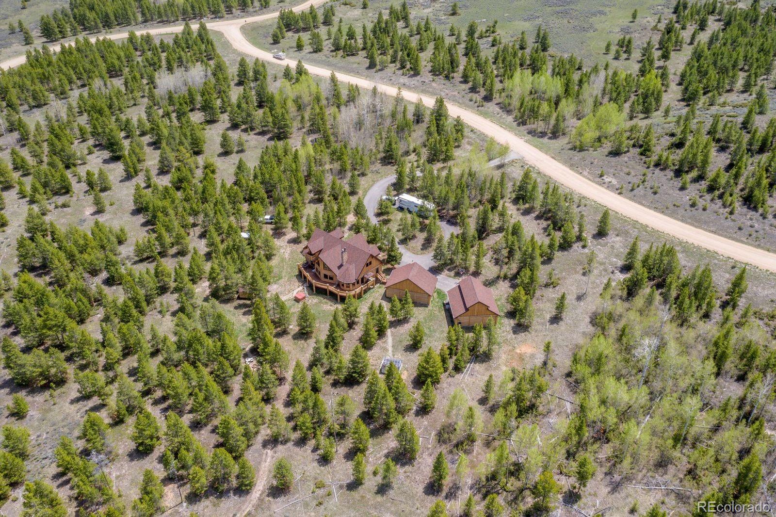 160 County Road Tabernash, CO 80478 - Photo 31 of 33 a view of a forest with a tree
