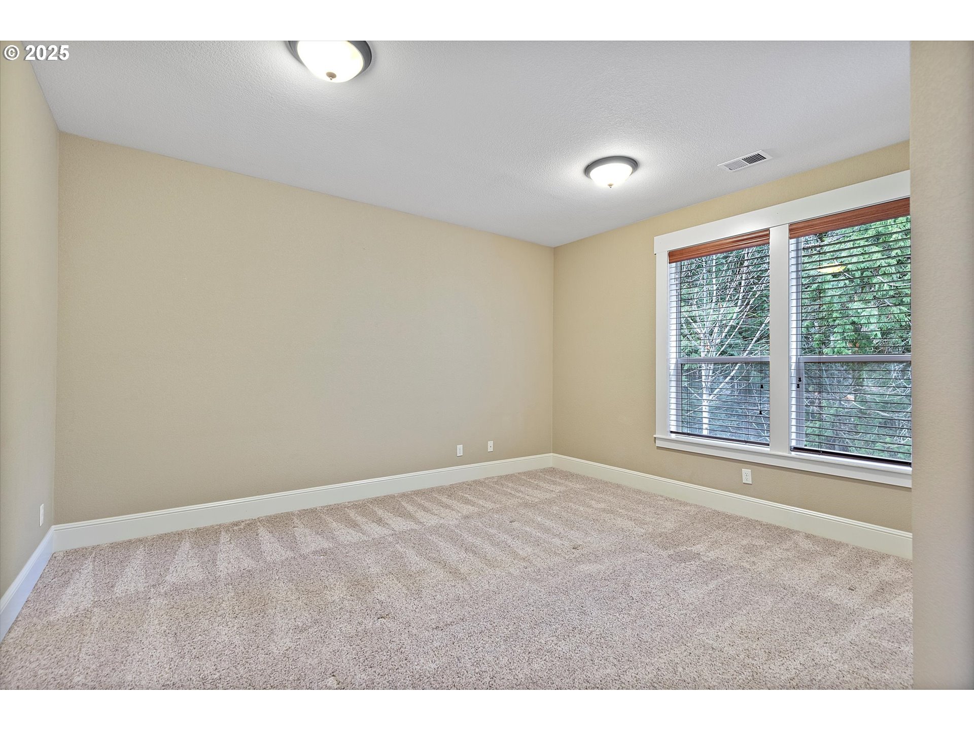 2875 Southeast Elliott Drive Gresham, OR 97080 - Photo 31 of 48 a view of an empty room with a window