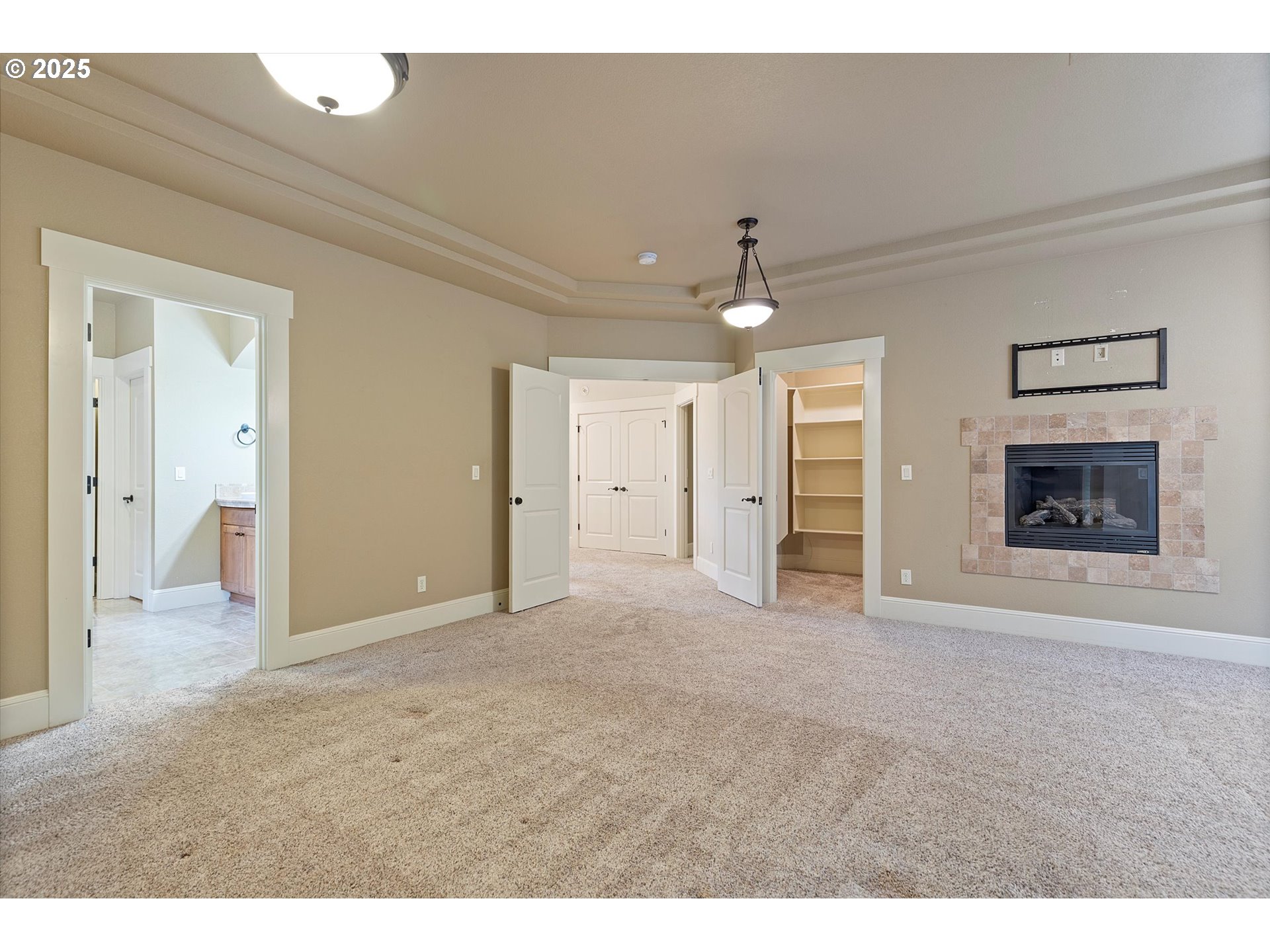 2875 Southeast Elliott Drive Gresham, OR 97080 - Photo 34 of 48 a view of a livingroom with an empty space and a fireplace