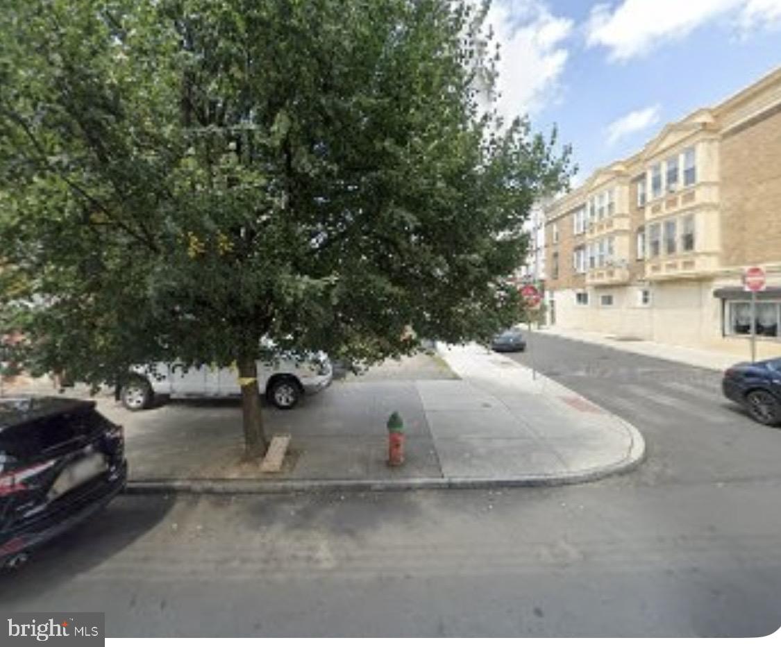 6219 Market Street Philadelphia, PA 19139 - Photo 2 of 2 a view of a street with cars