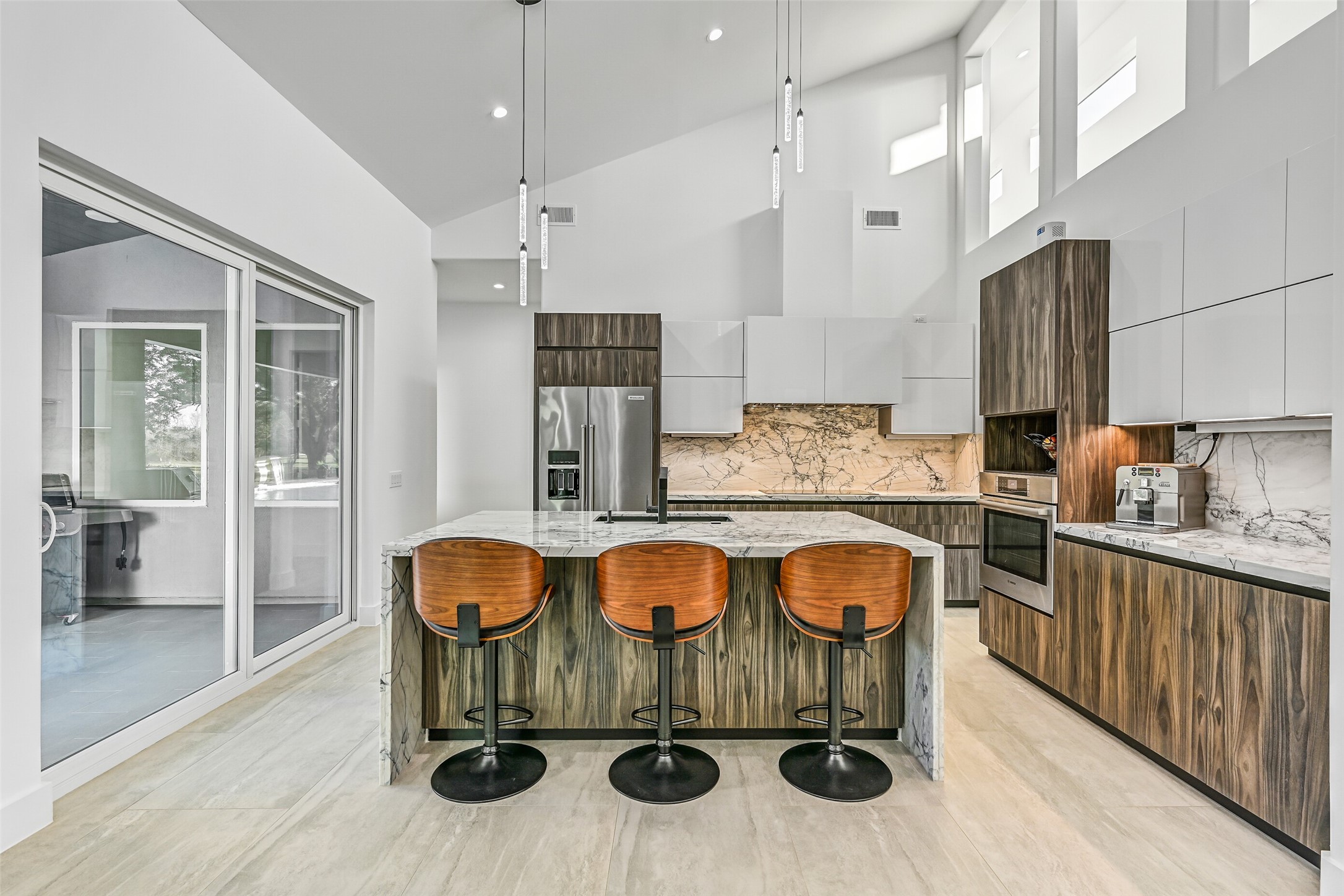 7627 Scott Avenue Manvel, TX 77578 - Photo 18 of 50 a kitchen with stainless steel appliances granite countertop a stove and cabinets