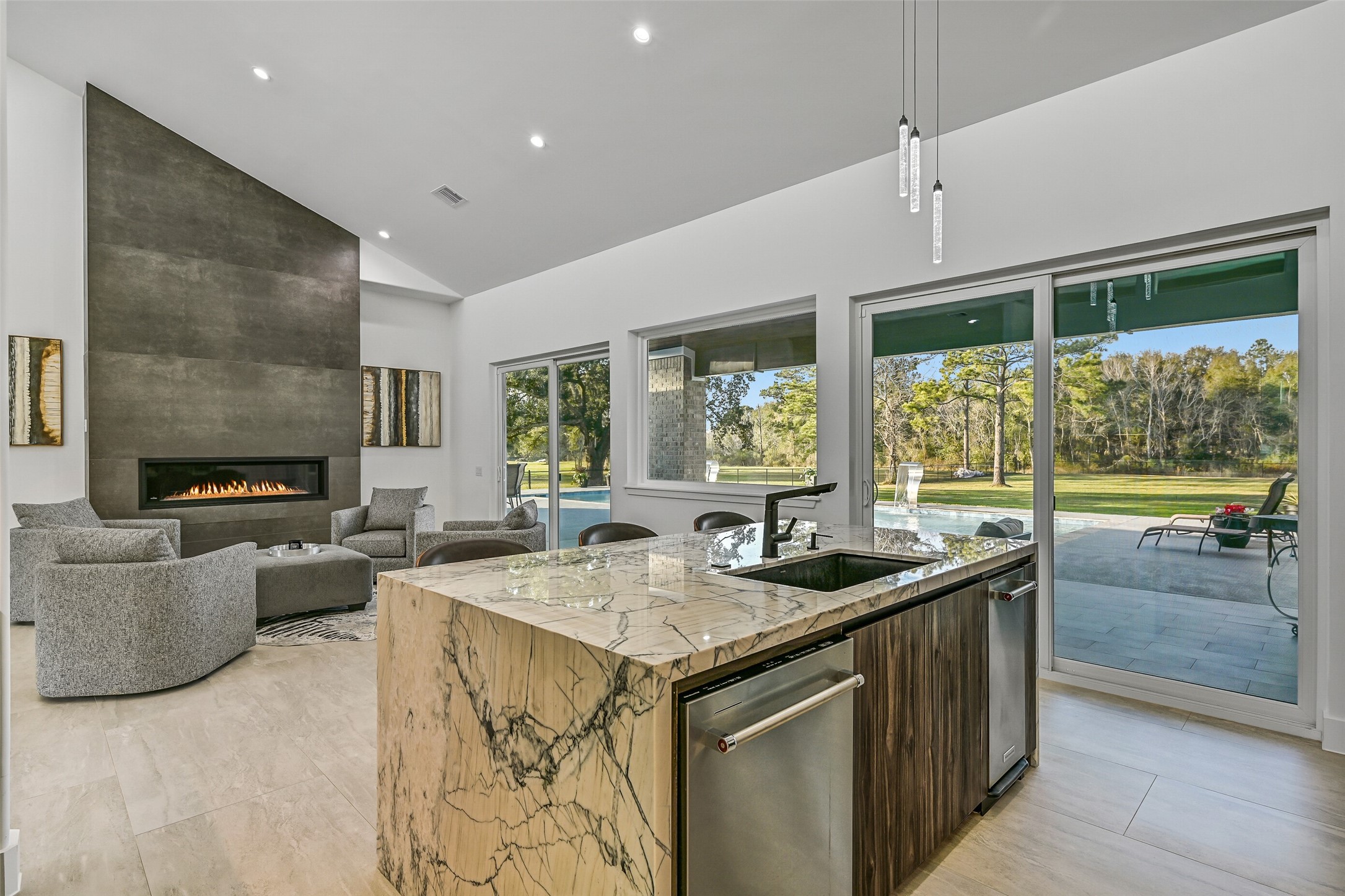 7627 Scott Avenue Manvel, TX 77578 - Photo 20 of 50 a kitchen with granite countertop a sink and a stove
