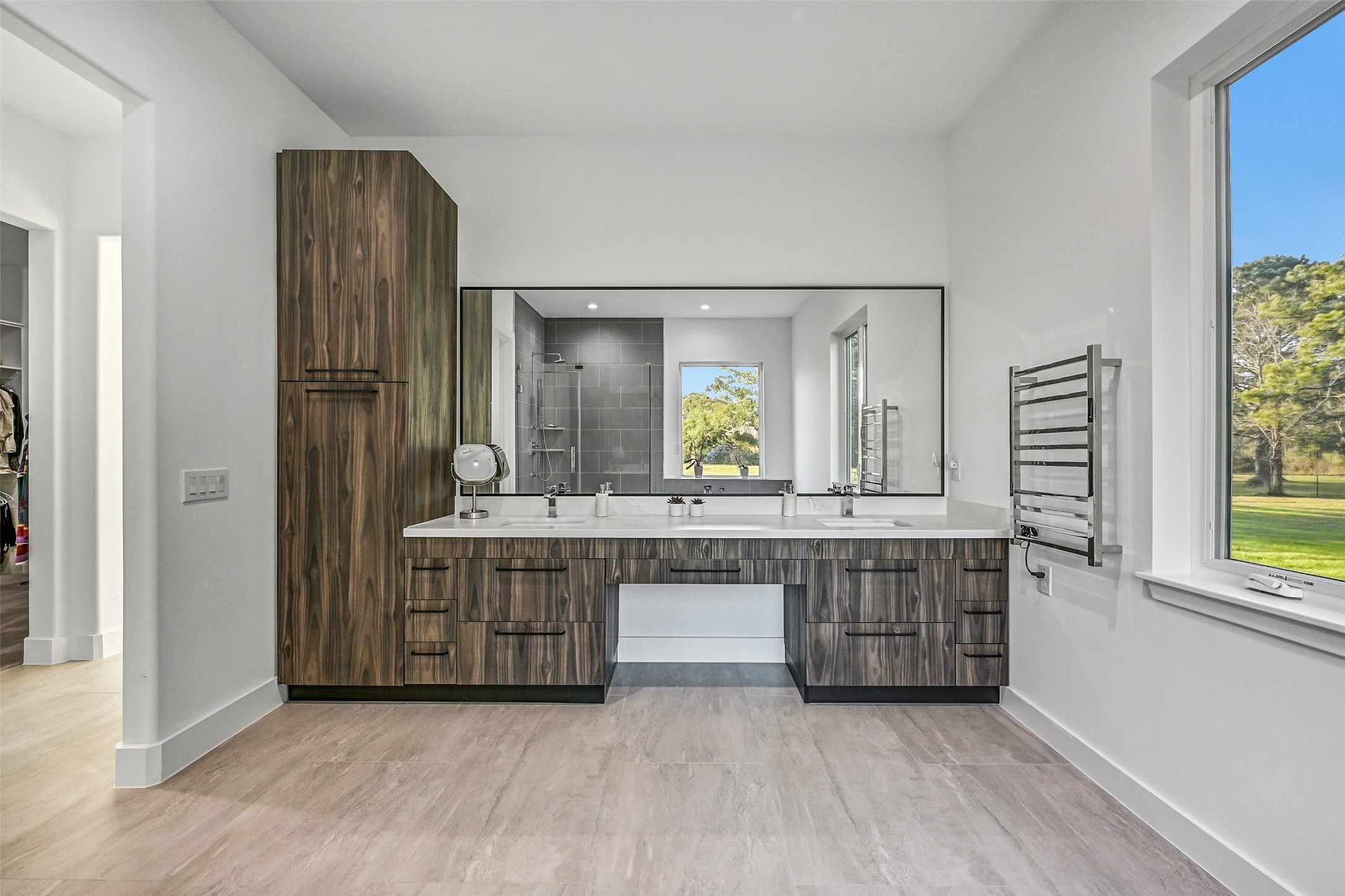 7627 Scott Avenue Manvel, TX 77578 - Photo 37 of 50 a bathroom with a granite countertop sink mirror and a bathtub