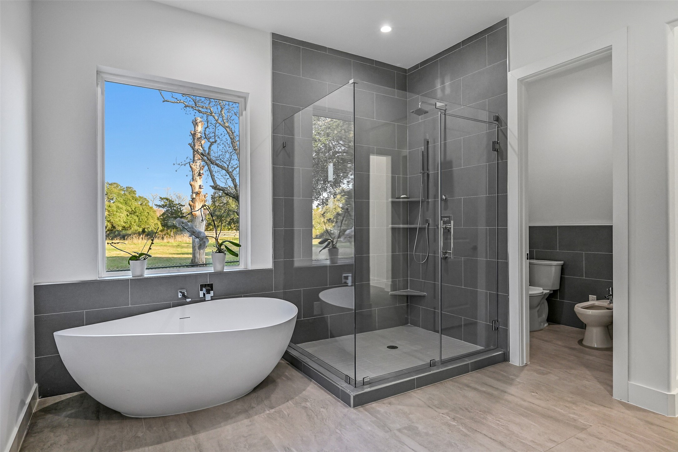 7627 Scott Avenue Manvel, TX 77578 - Photo 38 of 50 a bathroom with a tub and shower