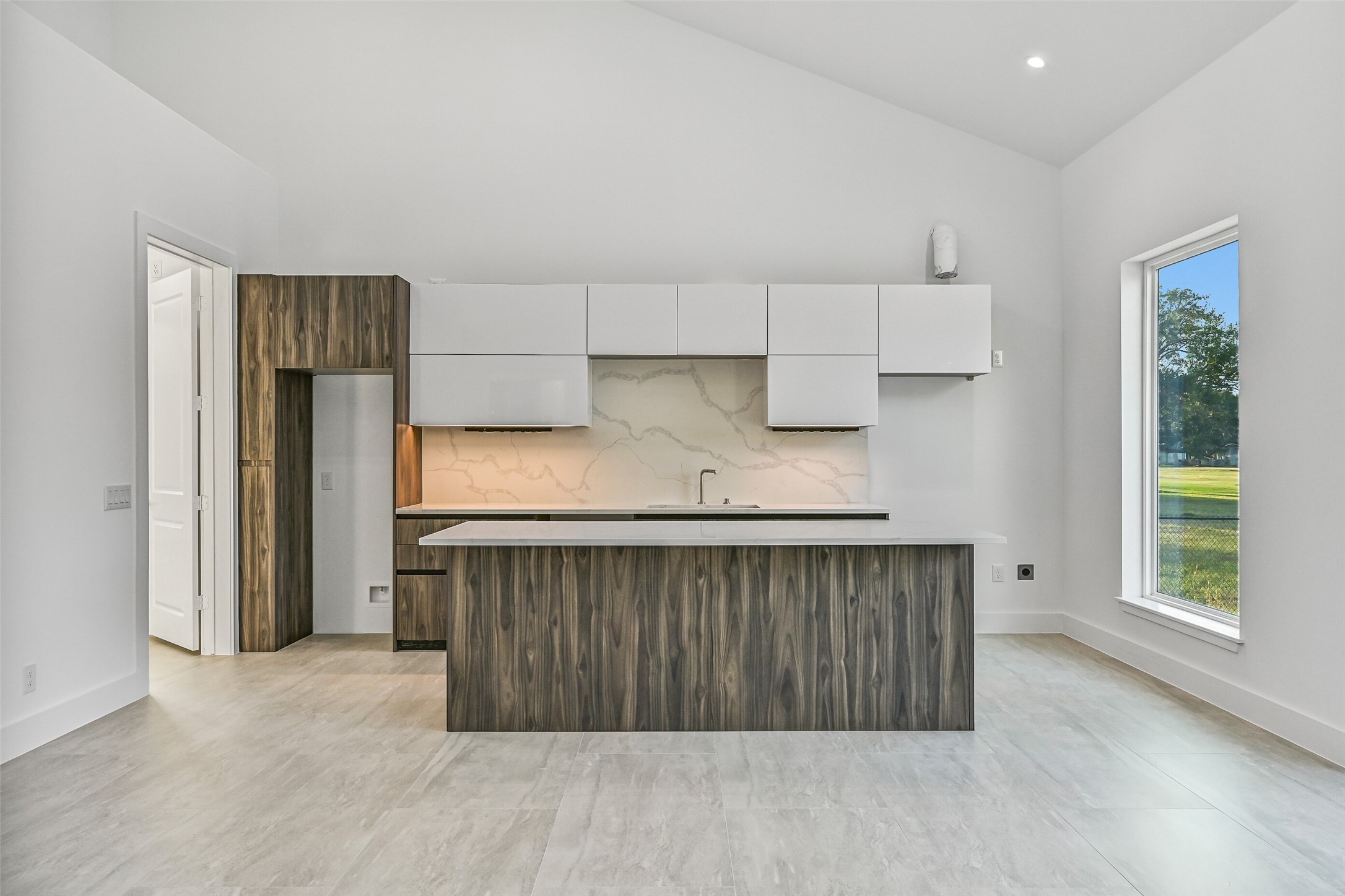 7627 Scott Avenue Manvel, TX 77578 - Photo 40 of 50 an entryway with wooden floor and cabinet