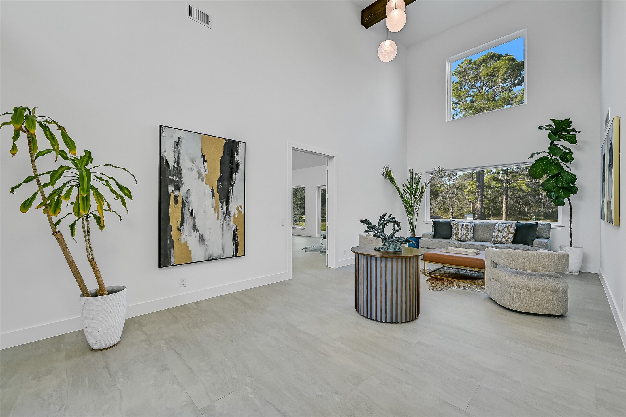 7627 Scott Avenue Manvel, TX 77578 - Photo 4 of 50 a living room with furniture and potted plant