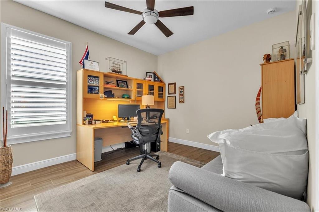 16424 Windsor Way Alva, FL 33920 - Photo 26 of 48 a work room with furniture and windows