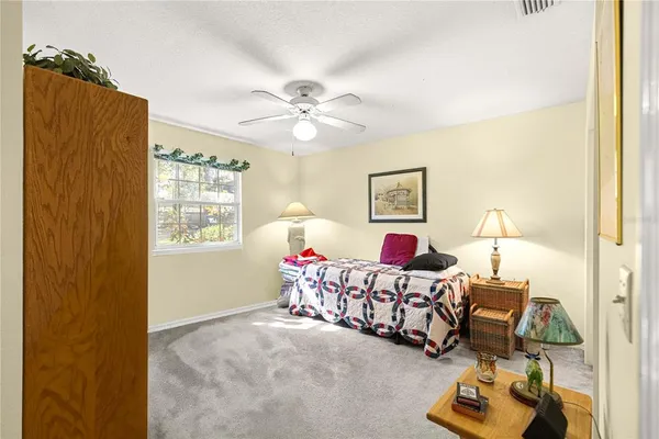 a kitchen with stainless steel appliances granite countertop a sink and a washer dryer