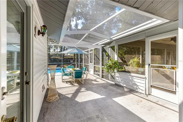 a view of a swimming pool with a lounge chairs