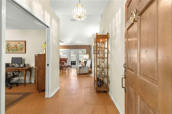 a view of entryway with wooden floor