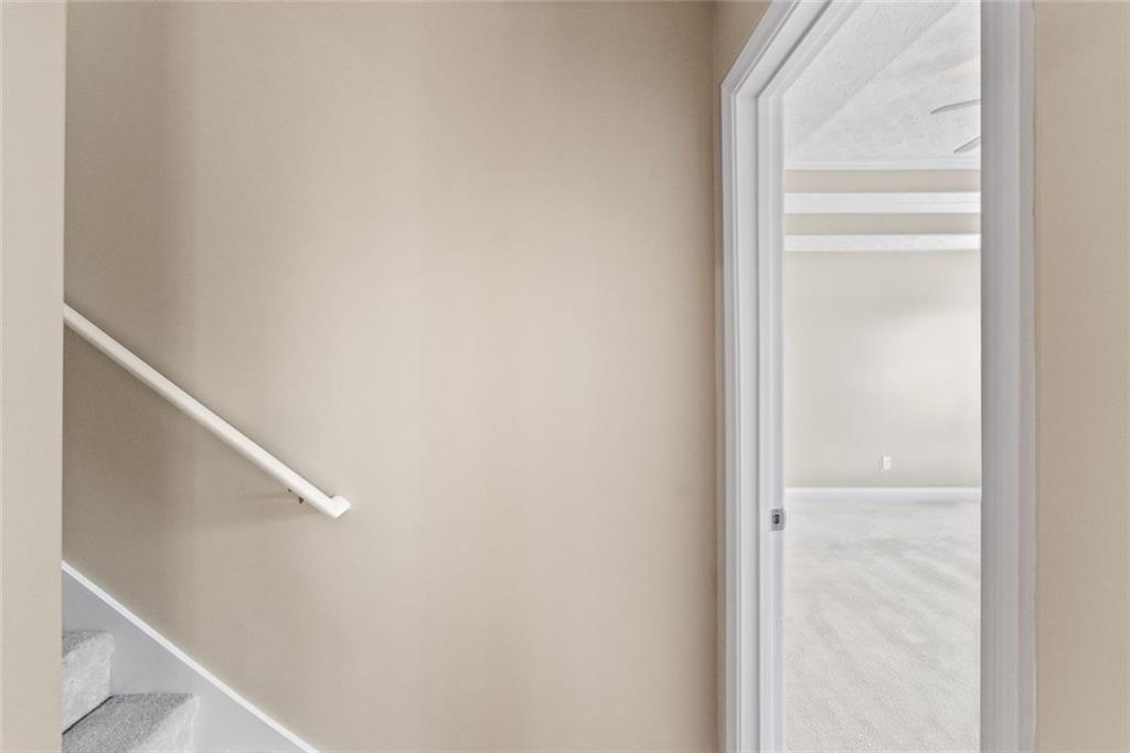 241 Red Bud Road Jefferson, GA 30549 - Photo 24 of 43 a view of staircase with white walls