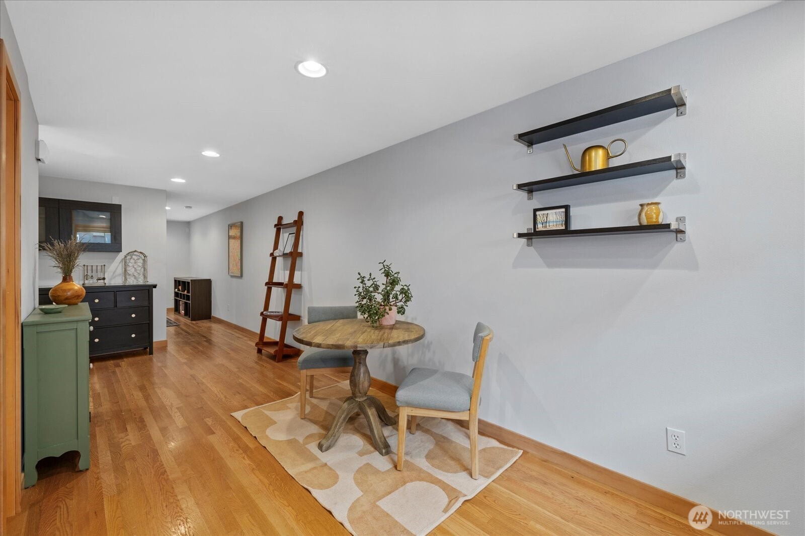 9748 4th Avenue Northwest, Unit B Seattle, WA 98117 - Photo 12 of 24 a living room with furniture and wooden floor