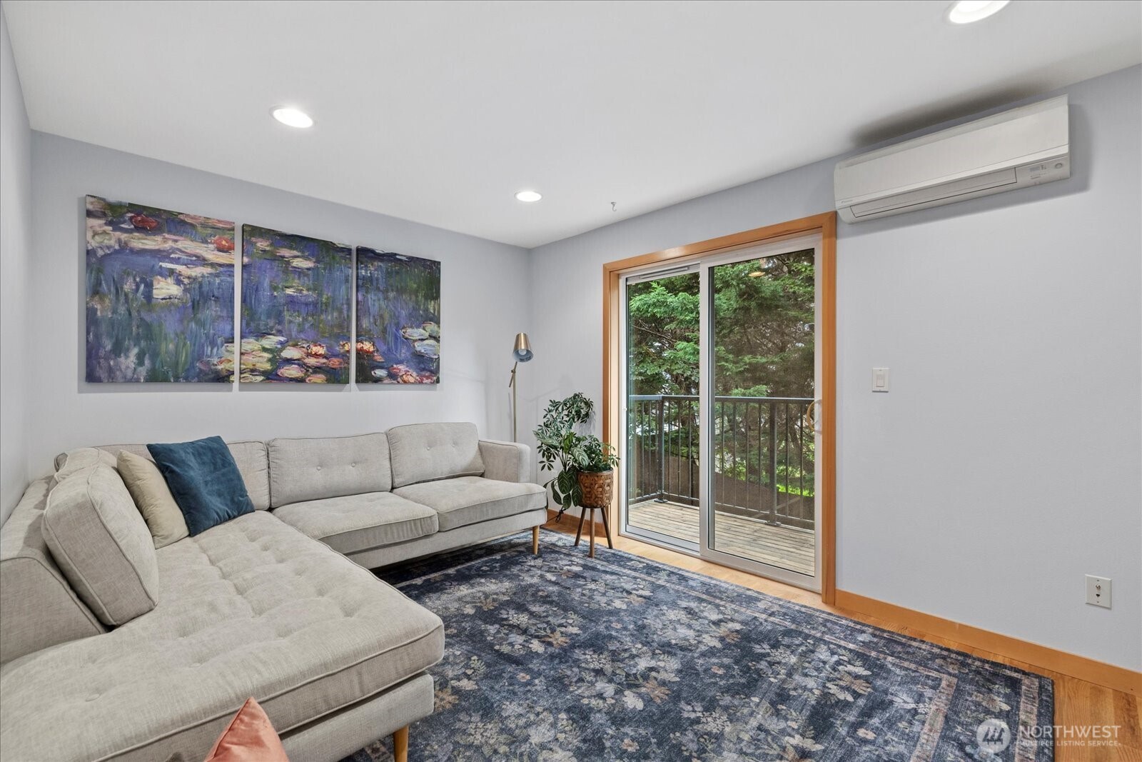 9748 4th Avenue Northwest, Unit B Seattle, WA 98117 - Photo 16 of 24 a living room with furniture and a large window
