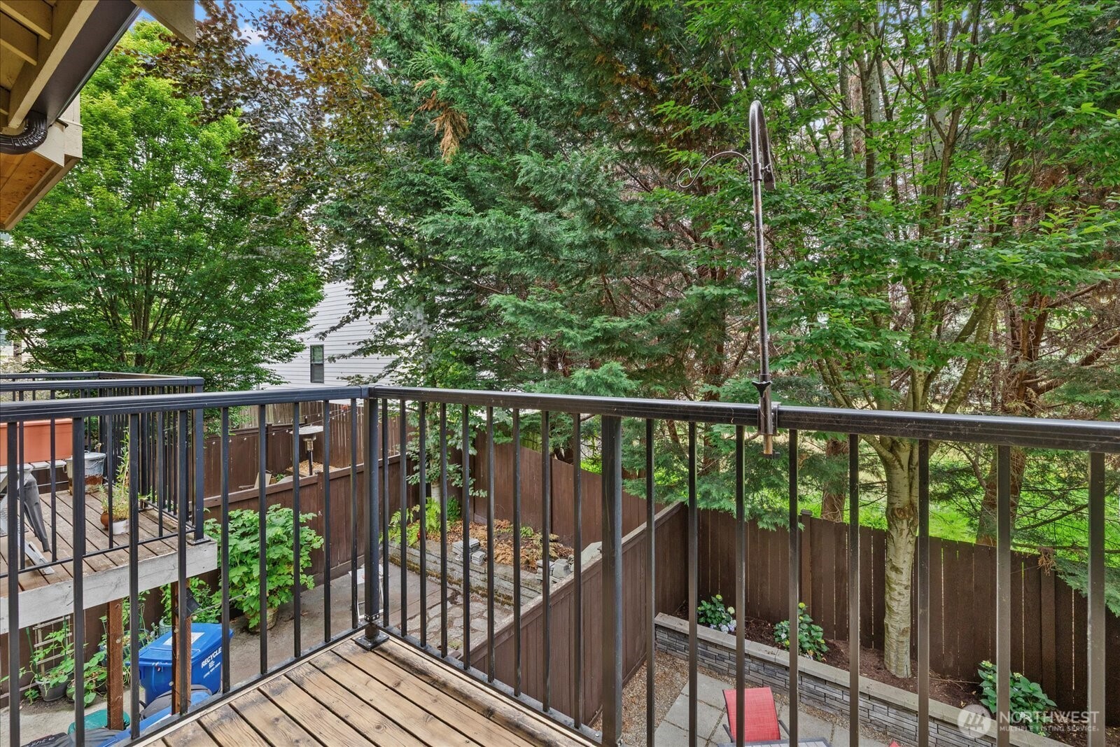 9748 4th Avenue Northwest, Unit B Seattle, WA 98117 - Photo 17 of 24 a view of a wooden roof deck