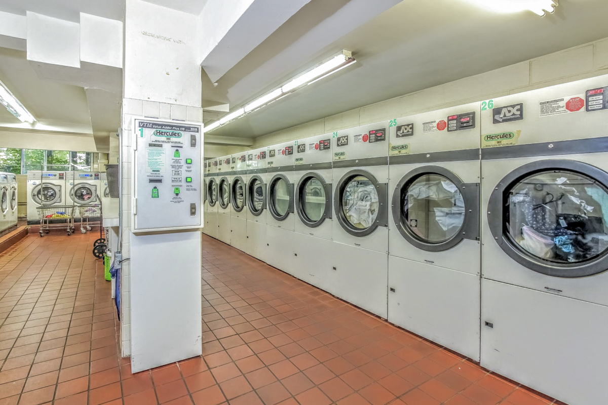 91 Strawberry Hill Avenue, Unit 331 Stamford, CT 06902 - Photo 17 of 19 a utility room with dryer and washer